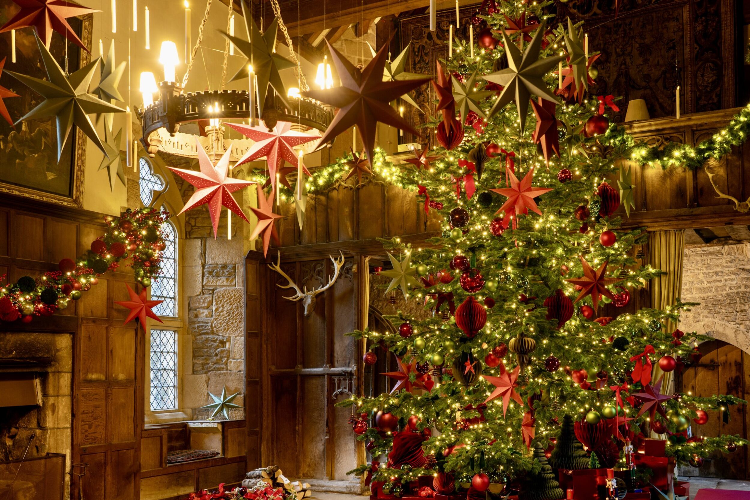Mercatum Christmas Market at Haddon Hall in Derbyshire, with festive market stalls in the historic courtyard.